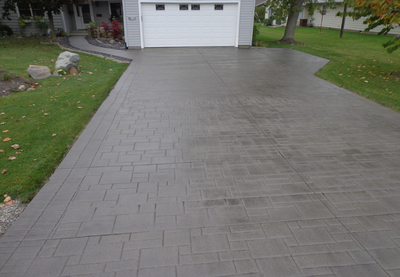 Brick paver stamped concrete driveway