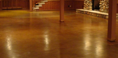 Basement concrete floor,  stained and polished.