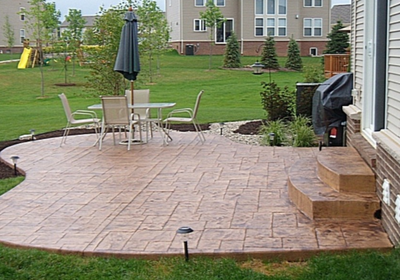 Stone shaped stamped concrete patio.